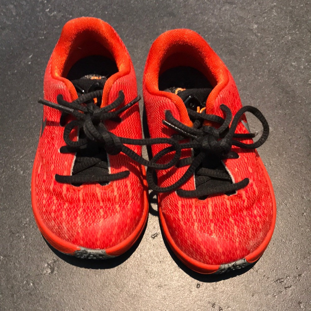 Orange Nike toddler tennis shoes
